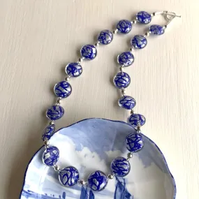 Necklace with blue pastel graffiti and white gold Murano glass medium lentil beads on silver